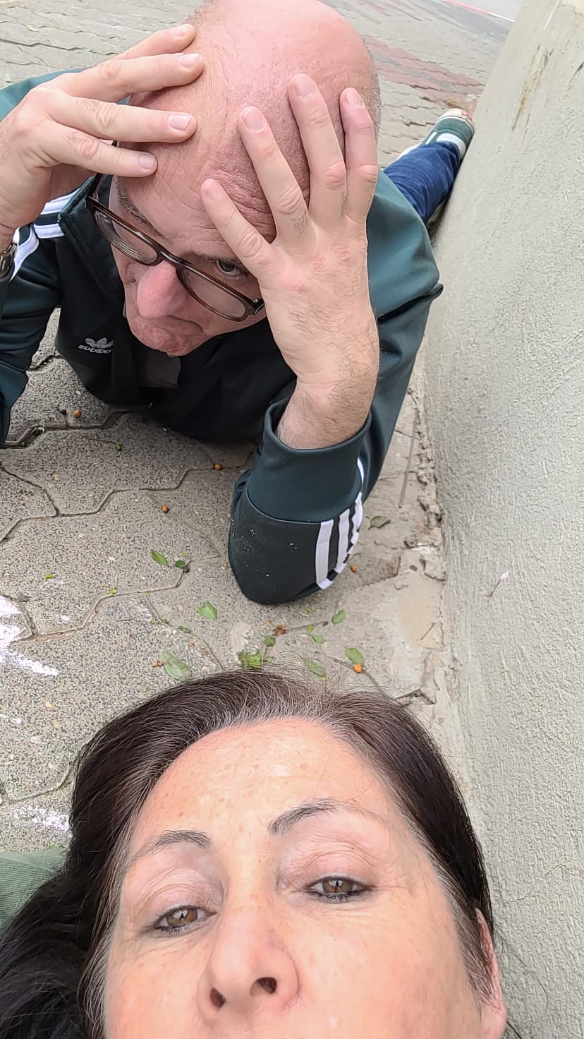 The author and his wife taking cover as the Iron Dome intercepts 2 missiles fired by Hamas at Raanana, a city in the center of Israel."   "The author and his wife taking cover as the Iron Dome intercepts 2 missiles fired by Hamas at Raanana, a city in the center of Israel.